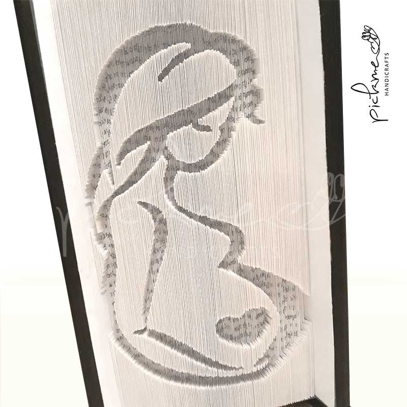 bookfolding βιβλιογλυπτική για γυναικολόγο υπό γωνία
